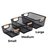 Three black mesh storage baskets with wooden handles in small, medium, and large sizes, ideal for kitchen and pantry organisation.