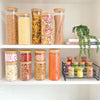 Glass pantry jars with bamboo lids, perfect storage organiser for kitchen, fridge, or laundry.