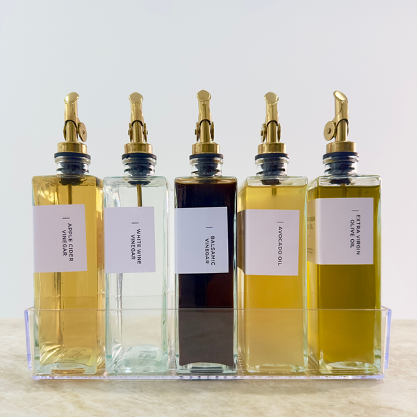Glass Oil & Vinegar Bottles with Tray β 5 Pack, featuring gold spouts and an acrylic tray, ideal for stylish kitchen storage.