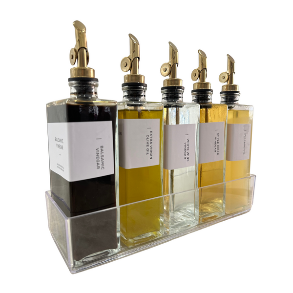Glass Oil & Vinegar Bottles with Tray β 5 Pack; elegant kitchen condiment set with gold spouts in a clear acrylic holder.