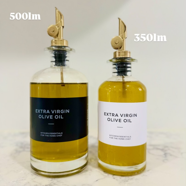 Round Glass Oil & Vinegar Bottle β 350ml Dispenser with stainless steel spout, next to 500ml bottle, on marble surface