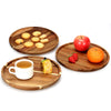 Acacia Wood Round Serving Tray displaying an array of snacks and drinks, ideal for kitchen or pantry organisation and storage solutions.