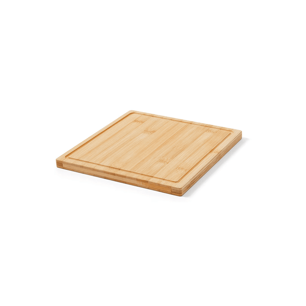 Bamboo cutting board for kitchen use, eco-friendly and durable surface, ideal for slicing.