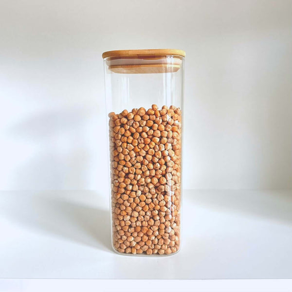 Glass jar from Square Bamboo Pantry Jars – 12-Pack Glass Storage Set, ideal for pantry organisation with chickpeas inside.