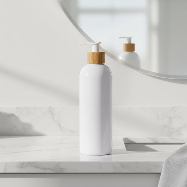 White bottle with a wooden pump on a white background