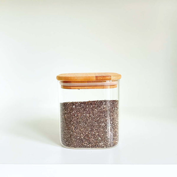 Glass pantry jar with bamboo lid, ideal for kitchen storage and space-saving organization.