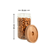 Round glass storage jar with acacia lid, 15cm tall, filled with almonds, ideal for kitchen or pantry organization, space-saving design.