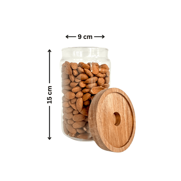Round glass storage jar with acacia lid, 15cm tall, filled with almonds, ideal for kitchen or pantry organization, space-saving design.