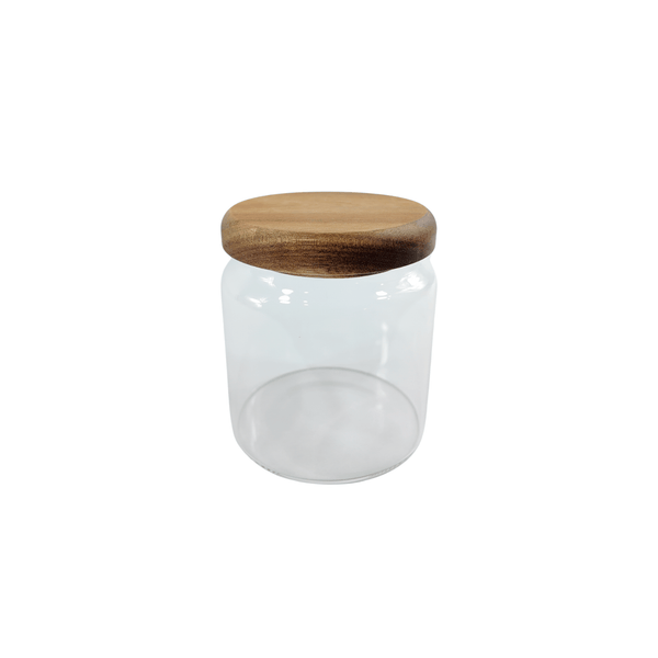 Glass jar with acacia lid; 600ml storage organizer perfect for pantry or fridge.