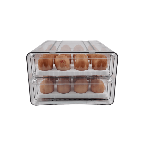 Transparent two-level egg organiser drawer for fridge storage and kitchen space-saving.