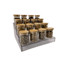 Expandable 4-tier clear spice rack with jars for pantry storage.