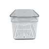 Clear fridge organiser with lid, ideal for space-saving storage in kitchen or pantry.