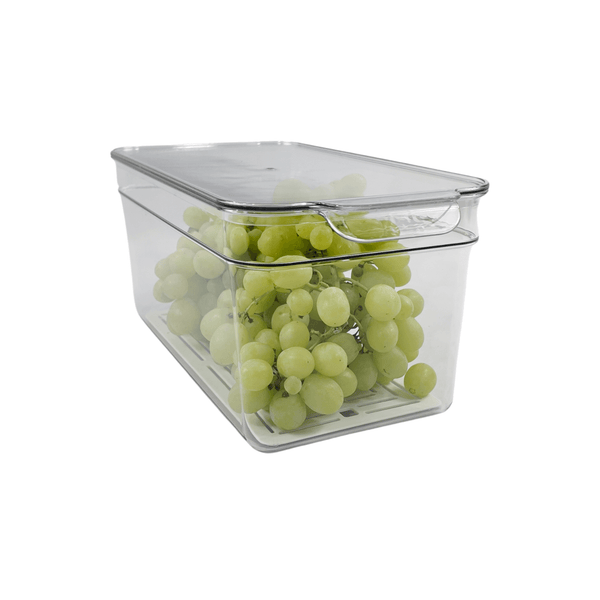 Clear fridge organizer with lid storing grapes, ideal for pantry or fridge space-saving storage.