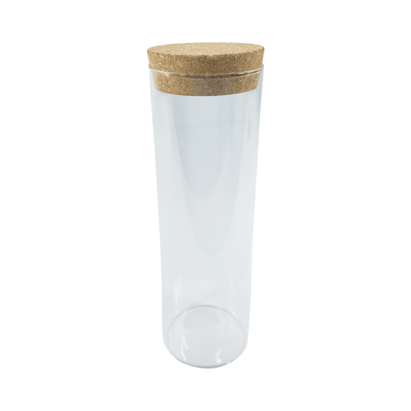 Glass storage jar with cork lid, 550ML for pantry and fridge organization.