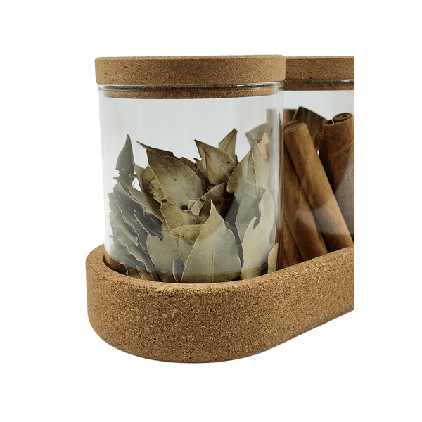 Glass jars with cork lids, 450ML, storing bay leaves and cinnamon sticks; ideal kitchen pantry organiser.
