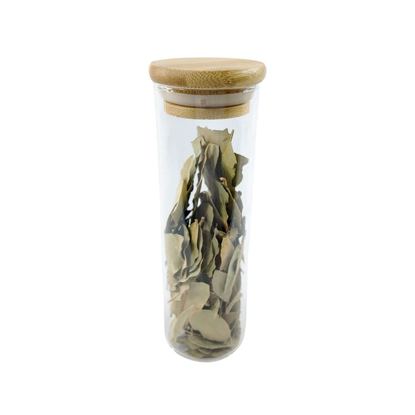 Glass spice jar with bamboo lid, perfect for pantry storage and kitchen organization.