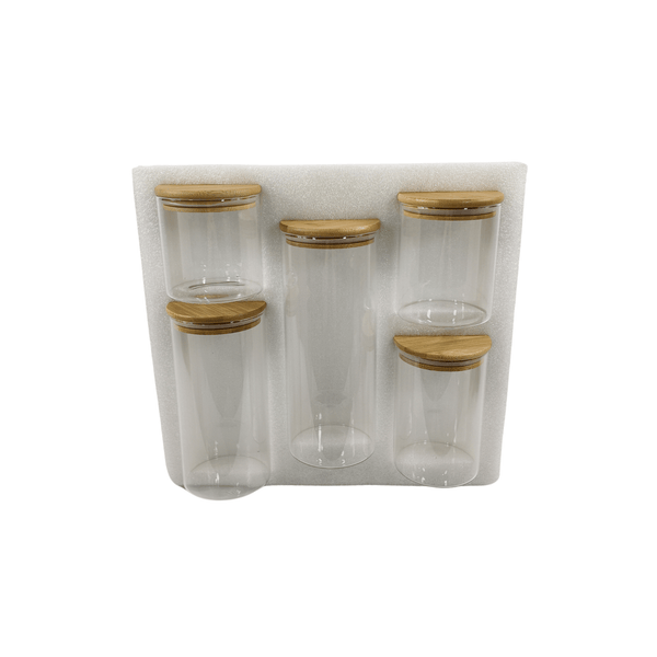 Set of 5 round glass bamboo storage jars, ideal for pantry or fridge organization.