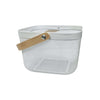 Small white mesh basket with wooden handle, ideal for kitchen storage and organization.