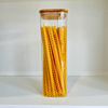 Square Bamboo Glass Pantry Jar Set – 5 Stackable Sizes used for pantry organisation, showcasing kitchen storage of pasta in a glass jar.