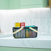 Large Black Handy Storage Basket with Wooden Handle holding pantry items on a kitchen countertop for kitchen organisation.