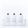 Clear Storage Tub With Handles - Medium holding bottles, ideal for bathroom or kitchen organisation, perfect for under sink storage.