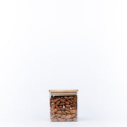 Square Glass Jar with Bamboo Lid – 750ml Pantry Storage filled with almonds for kitchen and pantry organisation.