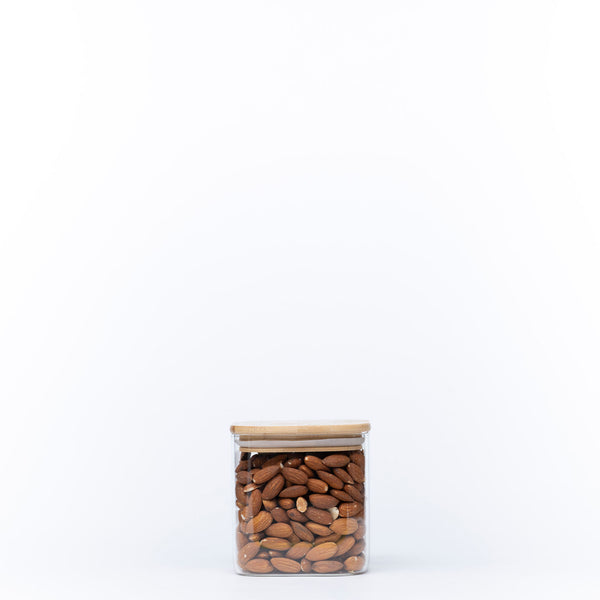 Square Glass Jar with Bamboo Lid – 750ml Pantry Storage filled with almonds for kitchen and pantry organisation.