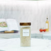 1200ml Acacia Screw-On Glass Pantry Jar storing breadcrumbs for kitchen organisation on a marble countertop.