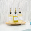 Round Glass Oil & Vinegar Bottle – 350ml Dispenser on a kitchen countertop for pantry organisation and kitchen storage.