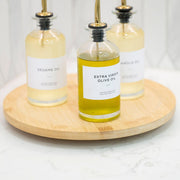 Bamboo Rotating Storage Turntable – Lazy Susan holding glass jars of spices, ideal for efficient kitchen organisation.