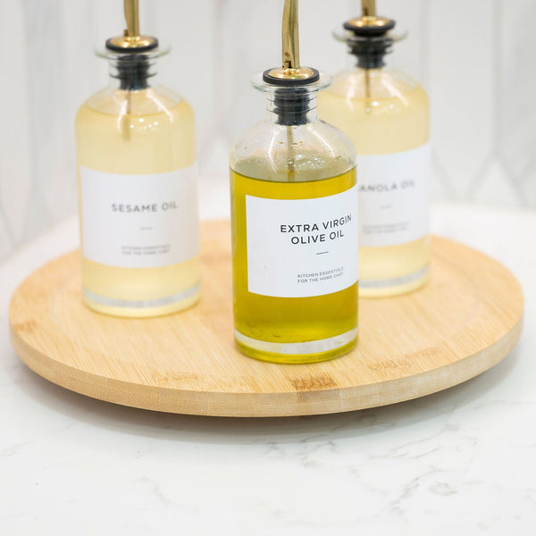 Bamboo Rotating Storage Turntable – Lazy Susan holding glass jars of spices, ideal for efficient kitchen organisation.