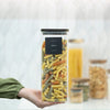 Square Acacia Lid Glass Jar – 5 Sizes used for storing pasta in a kitchen pantry for effective kitchen organisation.