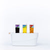 Small White Storage Tub – Stylish with Wooden Handles used for kitchen organisation, holding bottles for easy pantry access.