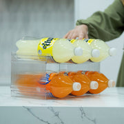 Large Stackable Bottle Organiser on a kitchen counter, ideal for pantry and fridge storage, offering clear, durable, space-saving design.
