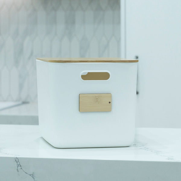 Plastic & Bamboo Storage Containers – Multi-Purpose Organisers for kitchen organisation on a countertop.