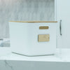 Stylish white plastic & bamboo storage container for kitchen organisation, ideal for pantry or counter.