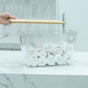 Clear Storage Container with Bamboo Lid – 29cm holding rolled-up towels, ideal for bathroom or pantry organisation.
