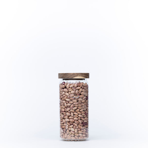 Round Glass Acacia Storage Jar from the 5 Pack, filled with beans, ideal for kitchen or pantry organisation and storage.