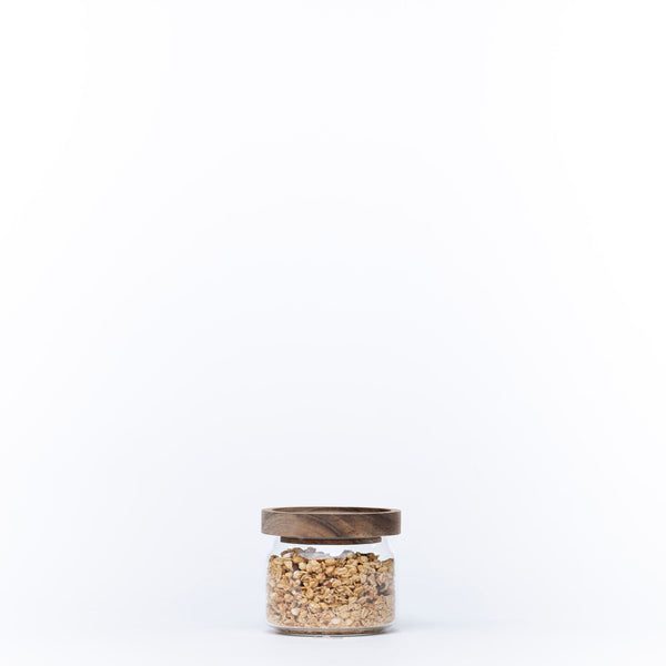 Round Glass Acacia Storage Jar filled with granola, ideal for kitchen or pantry organisation, part of a 5 Pack set.