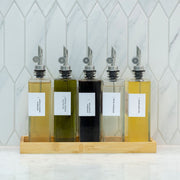 Alt Tag: Glass Oil & Vinegar Dispenser Set – 2 Pack (500ml, Book Style) for kitchen pantry organisation, shown with various oils.