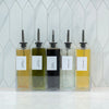 Glass Oil & Vinegar Bottles with Tray – 5 Pack on kitchen counter for pantry organisation and efficient kitchen storage.
