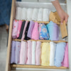 Neatly folded clothes organised with a drawer divider, featuring the New Home Set Up Pack for efficient drawer organisers.