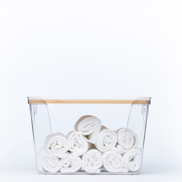 Clear Storage Container with Bamboo Lid – 29cm holding rolled towels, ideal for bathroom or under sink storage and organisation.