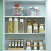 Whole Kitchen Organising Kit with glass jars for pantry organisation, featuring storage organisers for pasta, cereals, and spices.