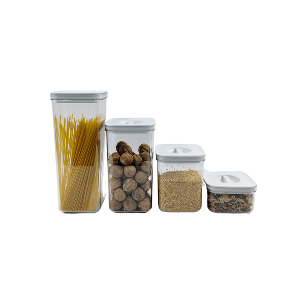 White twist canister set storing pasta, nuts, grains, and herbs; ideal pantry storage organiser.