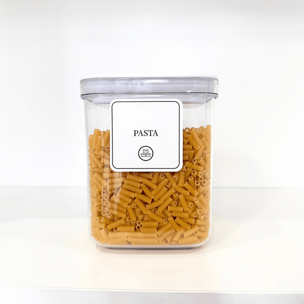 Transparent airtight container with twist lock filled with pasta, ideal for kitchen and pantry storage, home organisation, space-saving solutions.