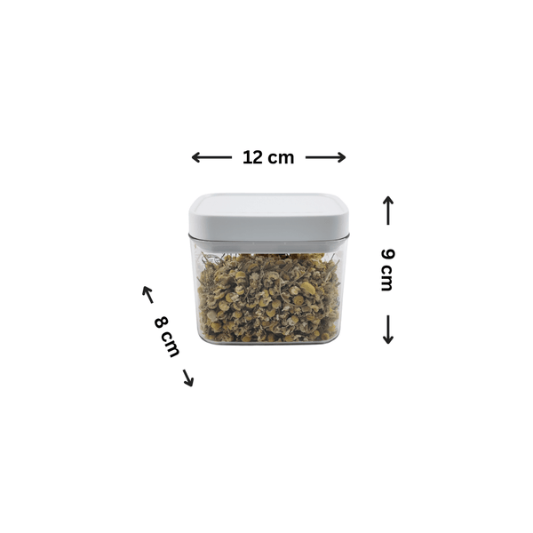 White airtight container measuring 12x8x9 cm with herbs, ideal for fridge storage.