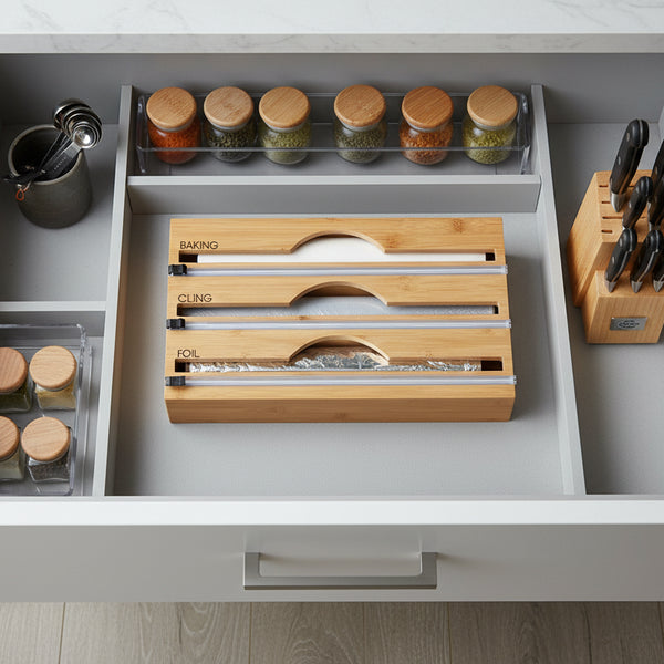 Bamboo Food Wrap Dispenser – 3 Inserts in a kitchen drawer with glass jars for efficient pantry organisation and storage.