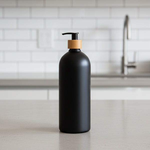 Black Bathroom Pump Bottle – 1 L Refillable Dispenser for kitchen bench, ideal for stylish and eco-friendly storage organisation.