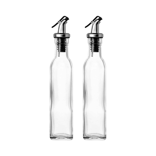 Clear glass oil and vinegar dispenser bottles, 550ml, perfect for kitchen storage and home organization, stylish and practical.